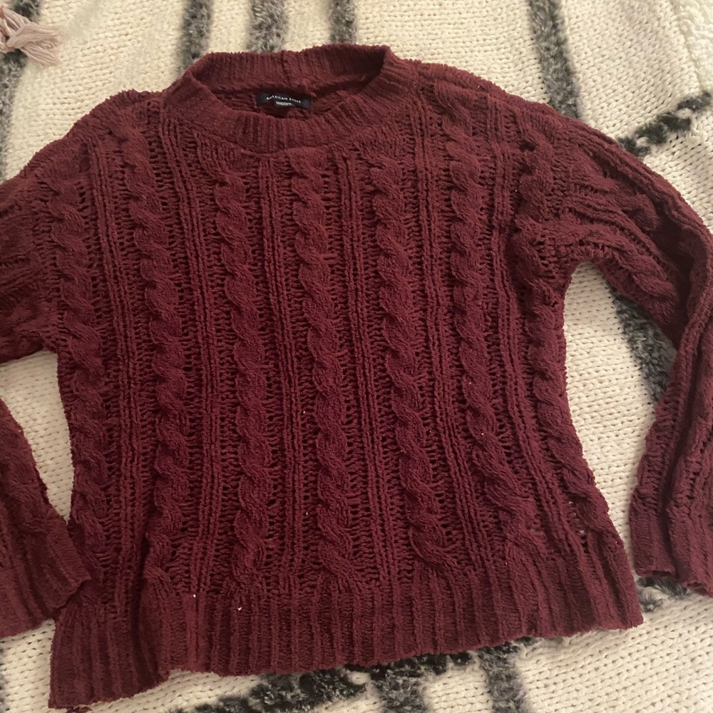 Dark red sweater